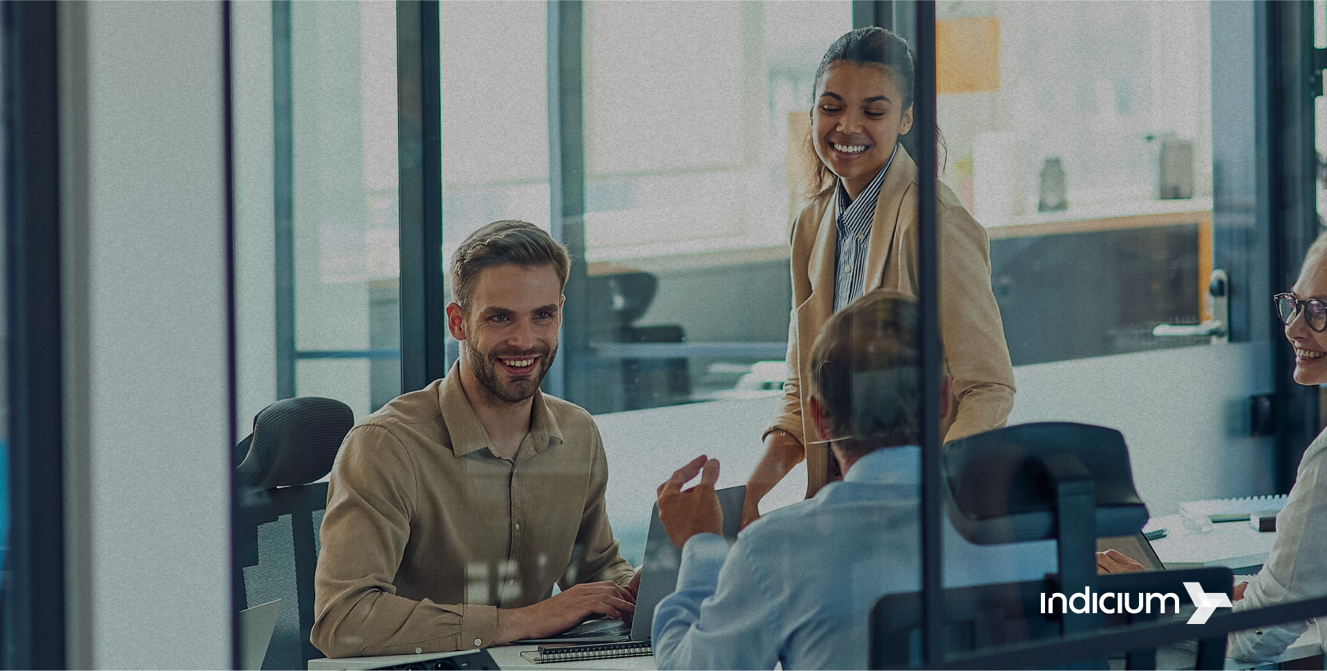 People at an office discussing enterprise AI adoption